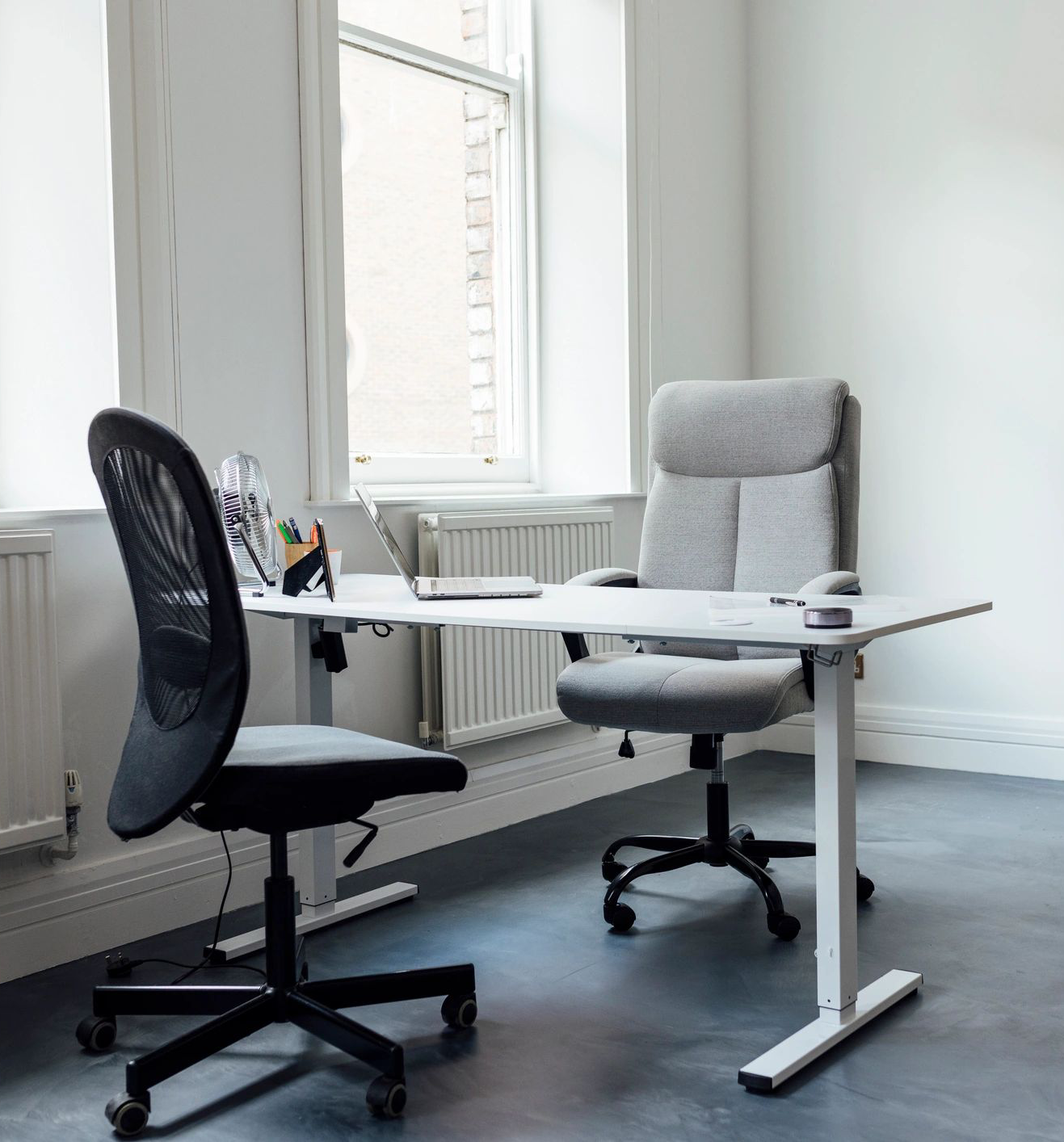 Empty office setup with swivel chairs
