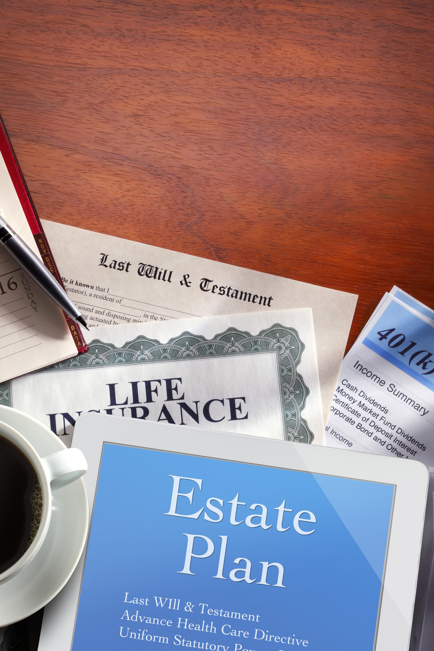 Estate planning documents on wooden desk