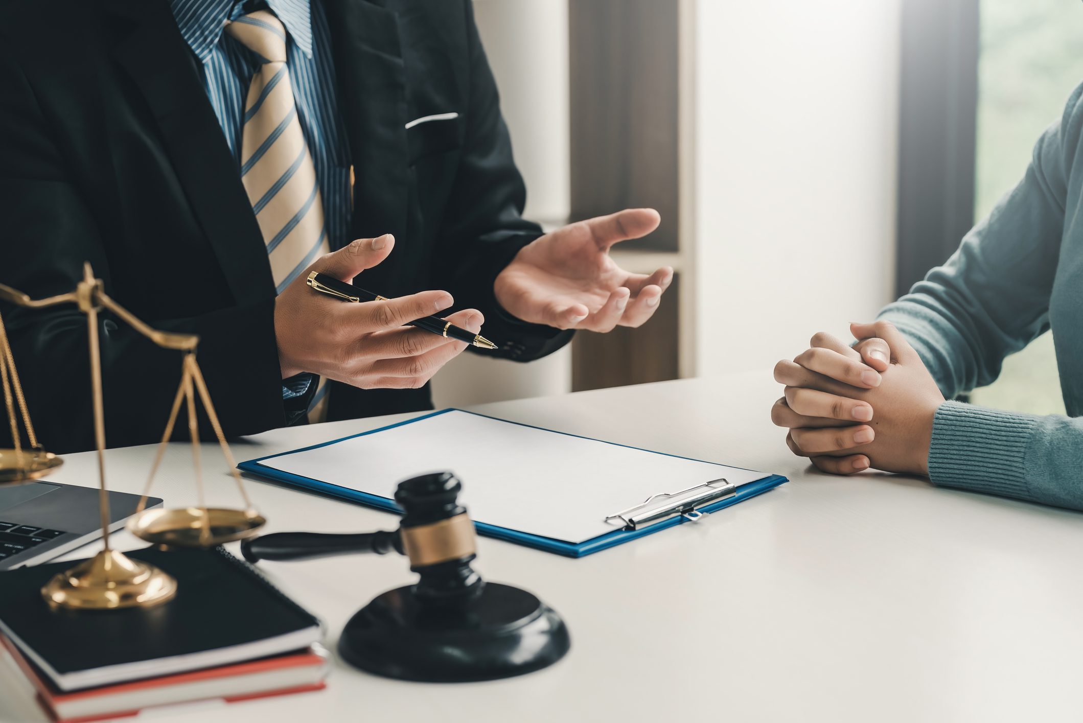 Legal consultation with gavel and scales